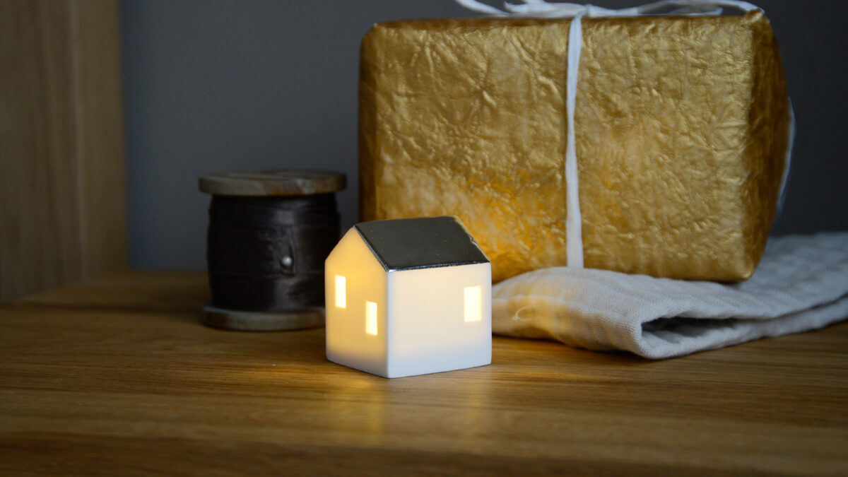porcelain mini light up house shown on
