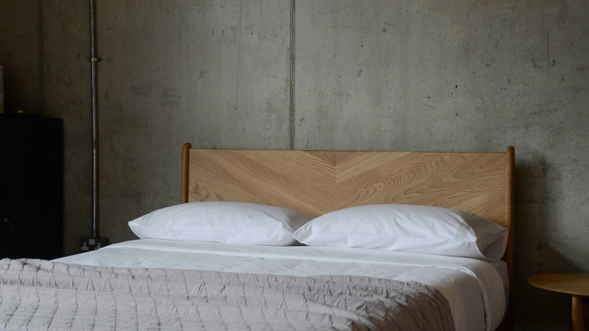 Solid Oak Hoxton bed with a chevron design to the headboard