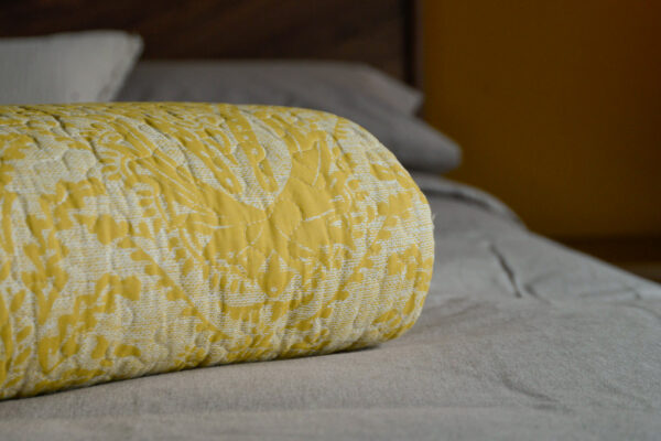 reversible printed floral damask pattern quilted bedspread in ivory and yellow ochre