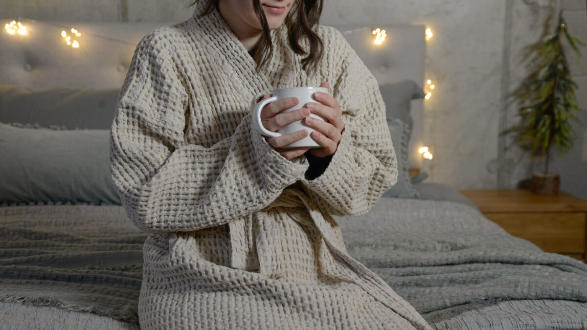 Organic Cotton Waffle Robe STONE on model with cup