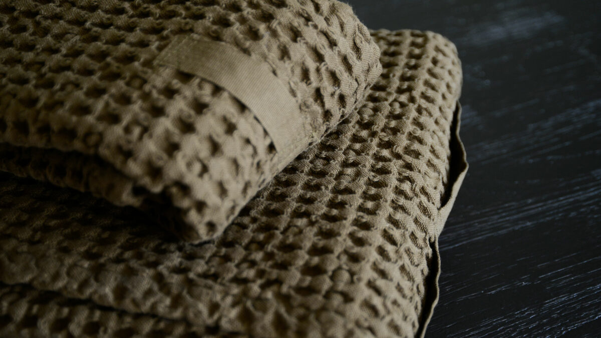 organic cotton waffle weave towels in a chocolate brown colour