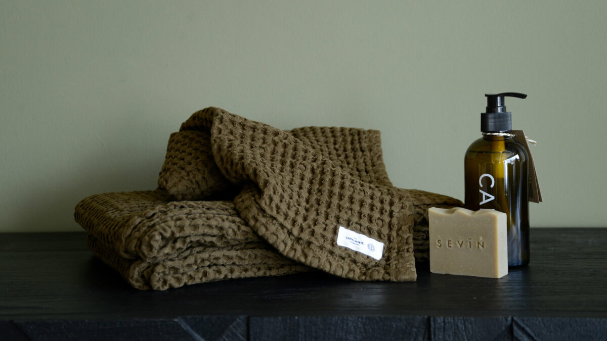 organic cotton waffle weave towel in a chocolate brown colour