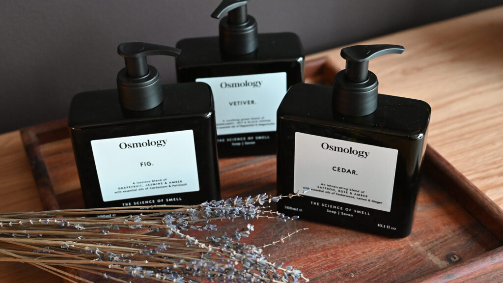 gig, vetiver and cedar luxury hand soaps on wooden tray.