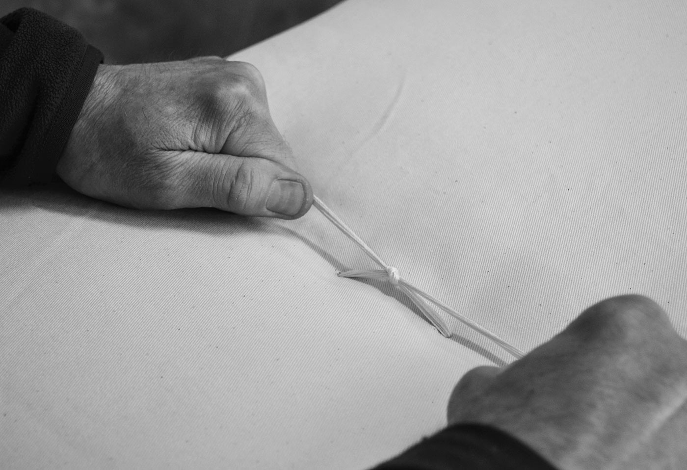 The final threading of our cotton covered hand-made futon mattress