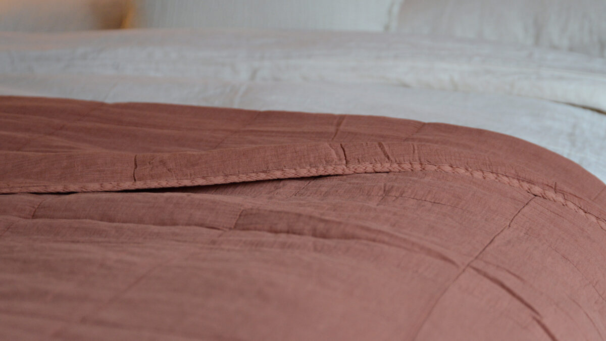 Plain Soft Bedspread Terracotta Folded