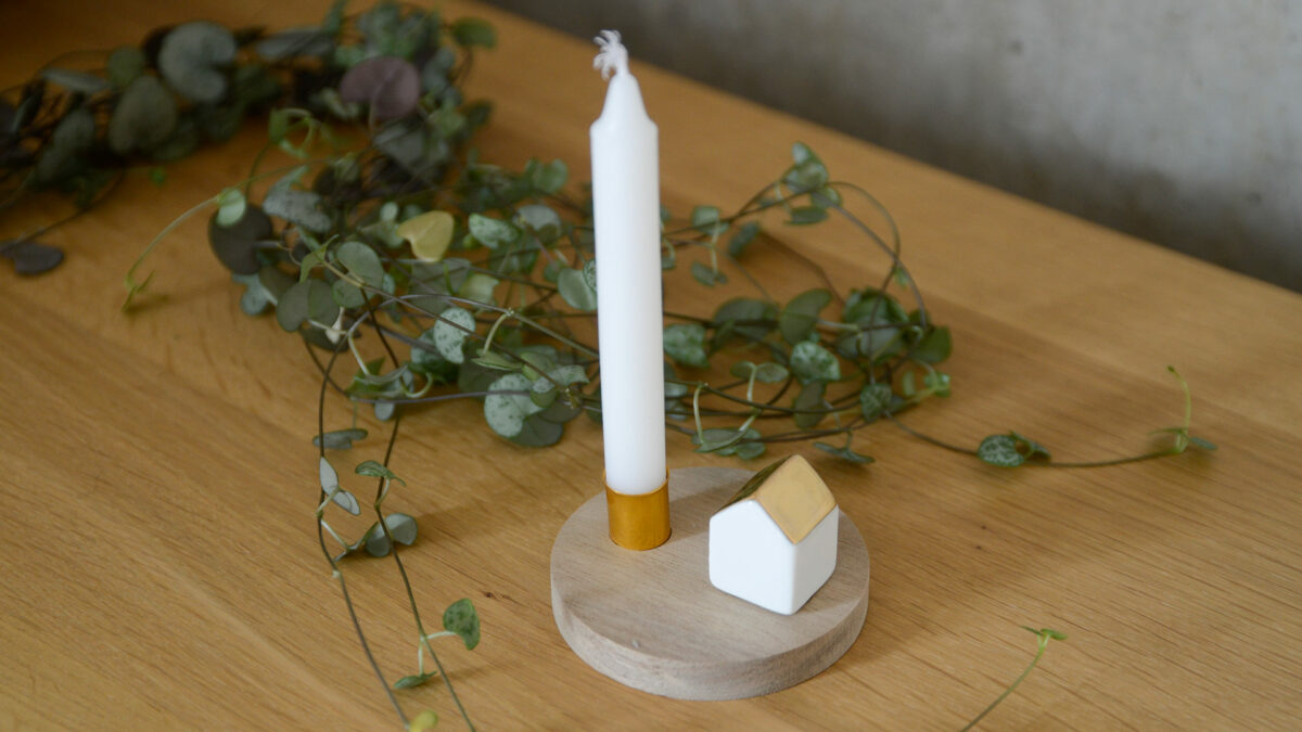 Rader House Candleholder with Candle Above