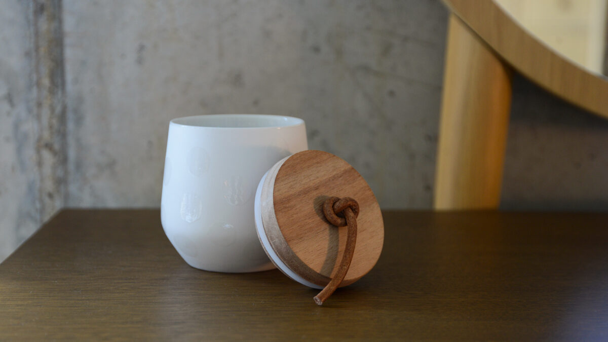 Rader Jar with Wooden Lid on Two Tone Dressing Table