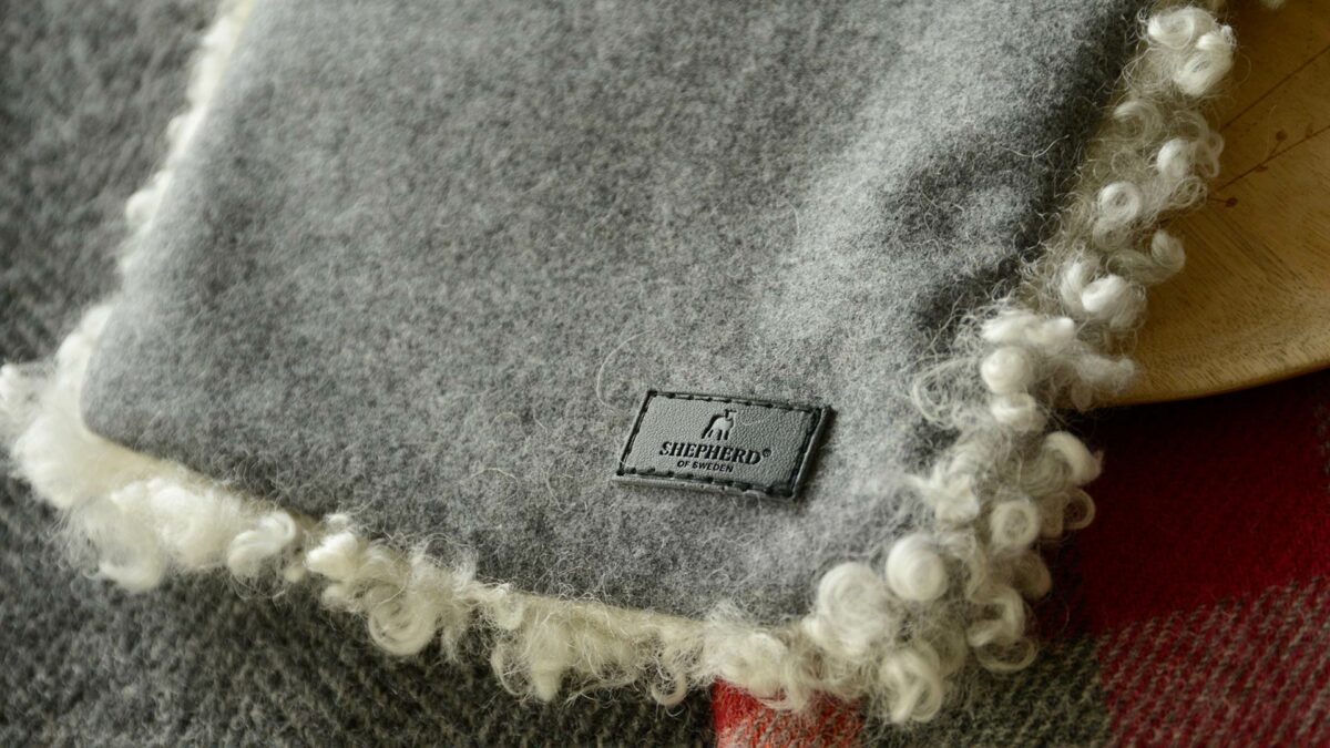 Shepherd Sheepskin HWB Back Logo