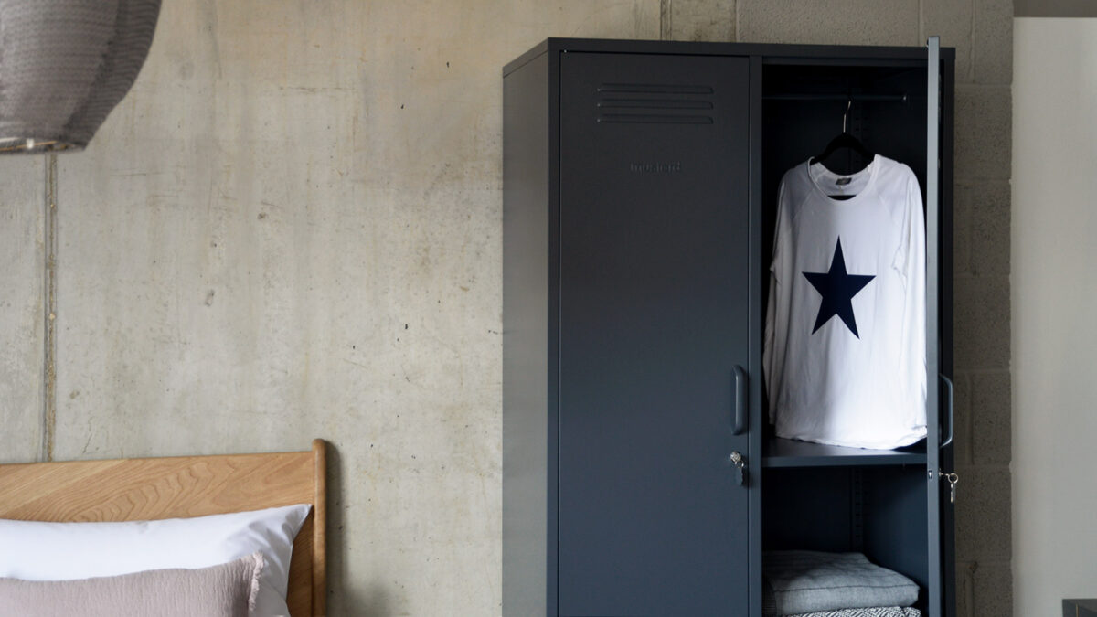 wardrobe metal storage locker in slate grey shown close up with one door open