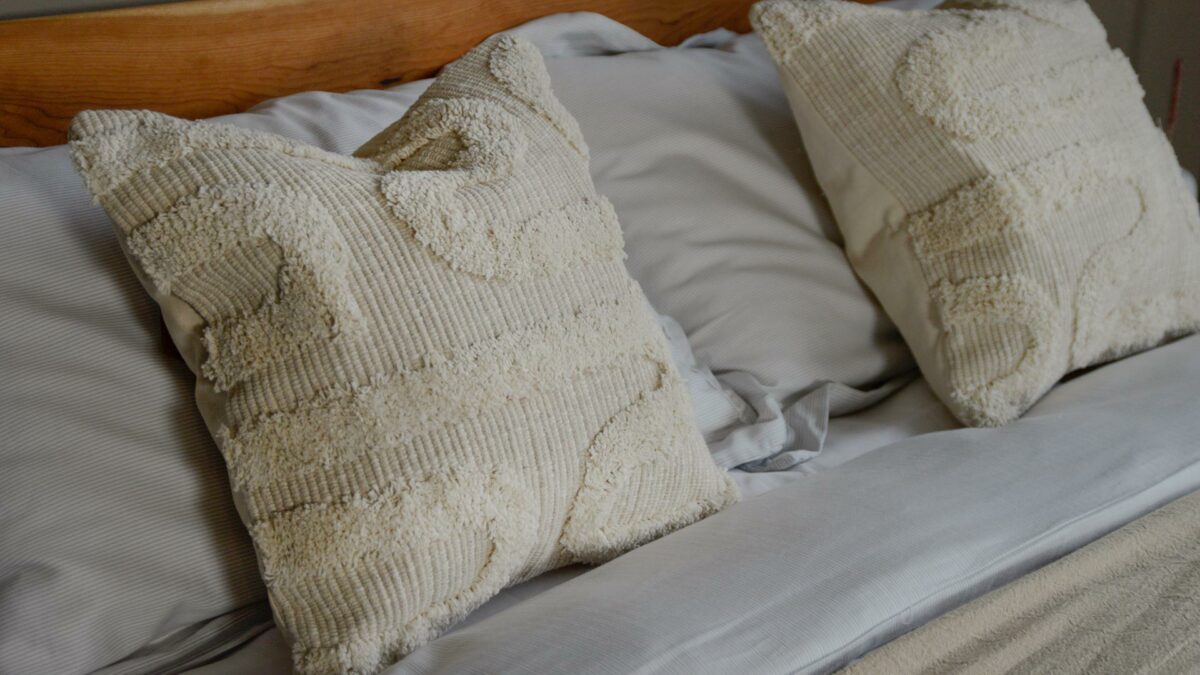 moroccan inspired tufted cream cushions
