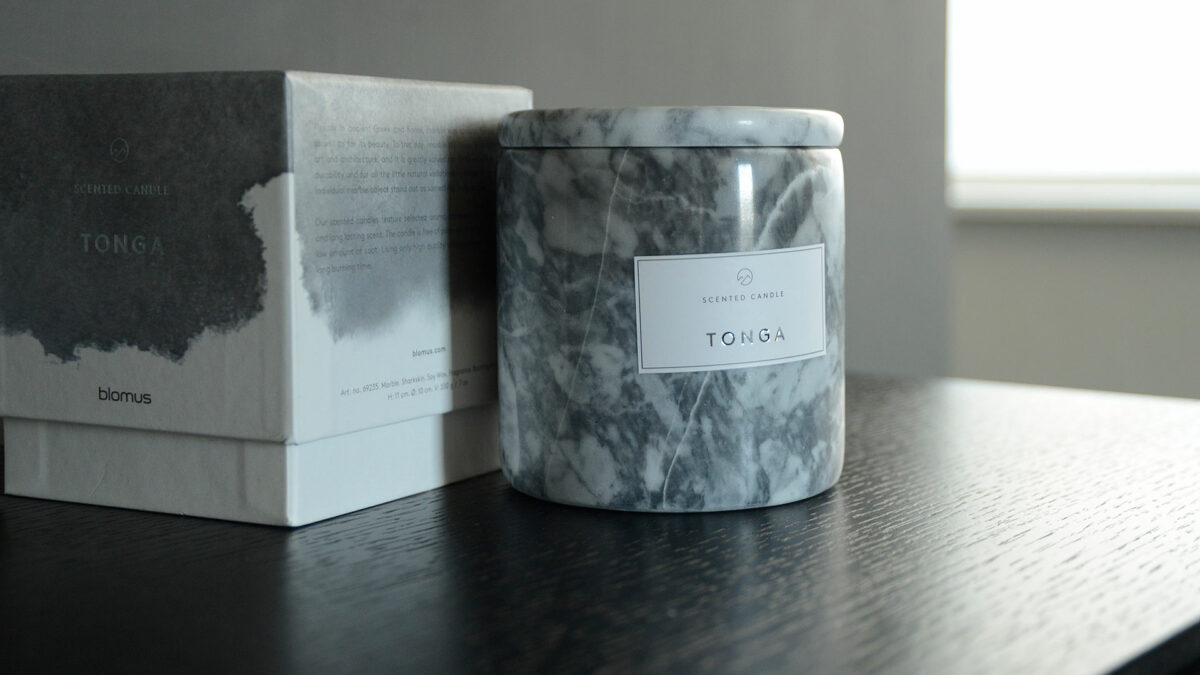 luxury gift-boxed scented candle in a grey marble pot