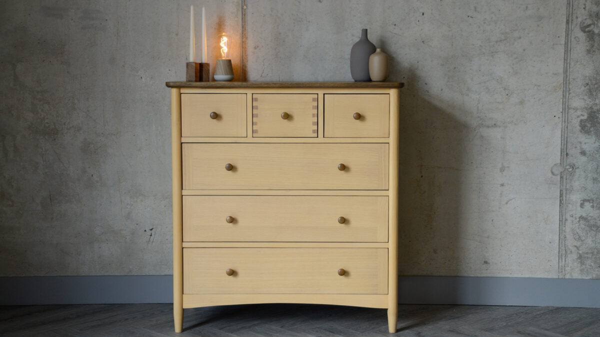 Two Tone 6 drawer chest front view with accessories