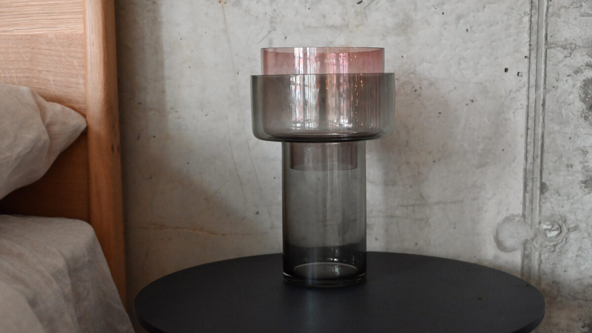 Two tone glass vase with removable top section.