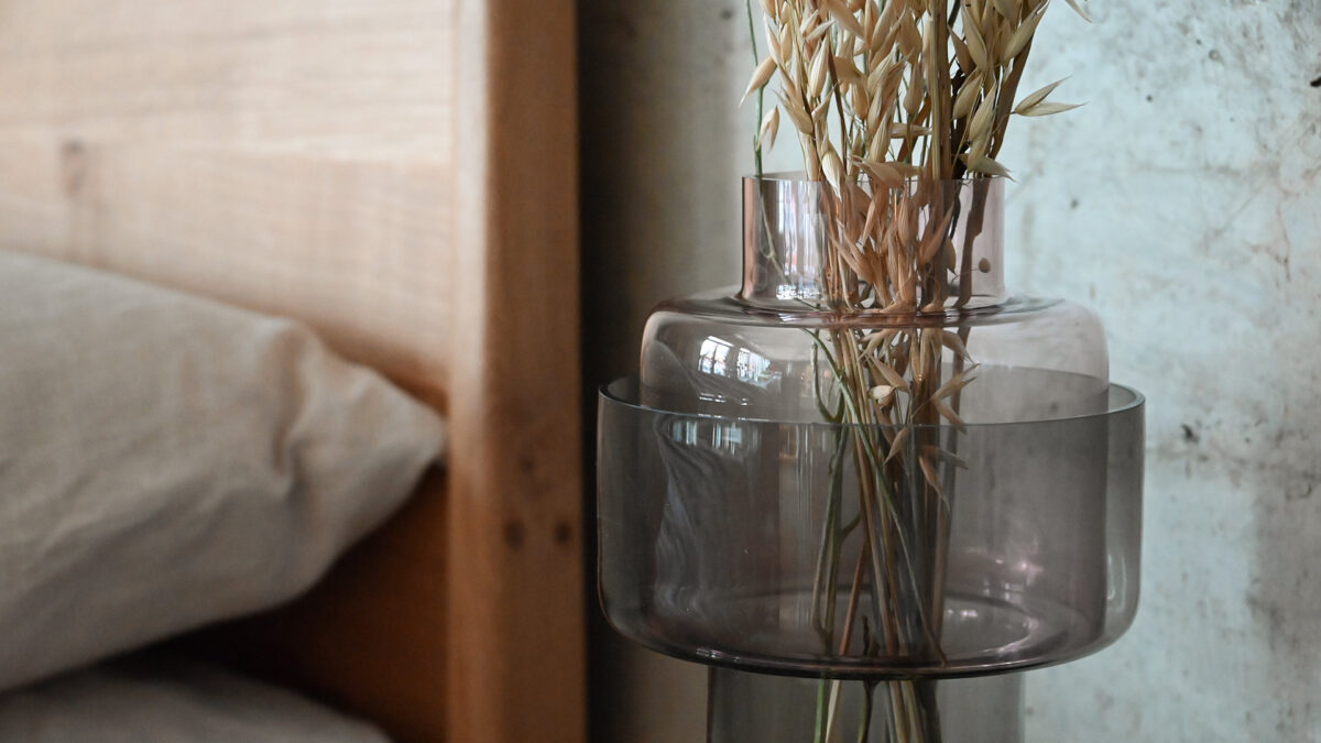 closeup of glass vase with small bouquet.