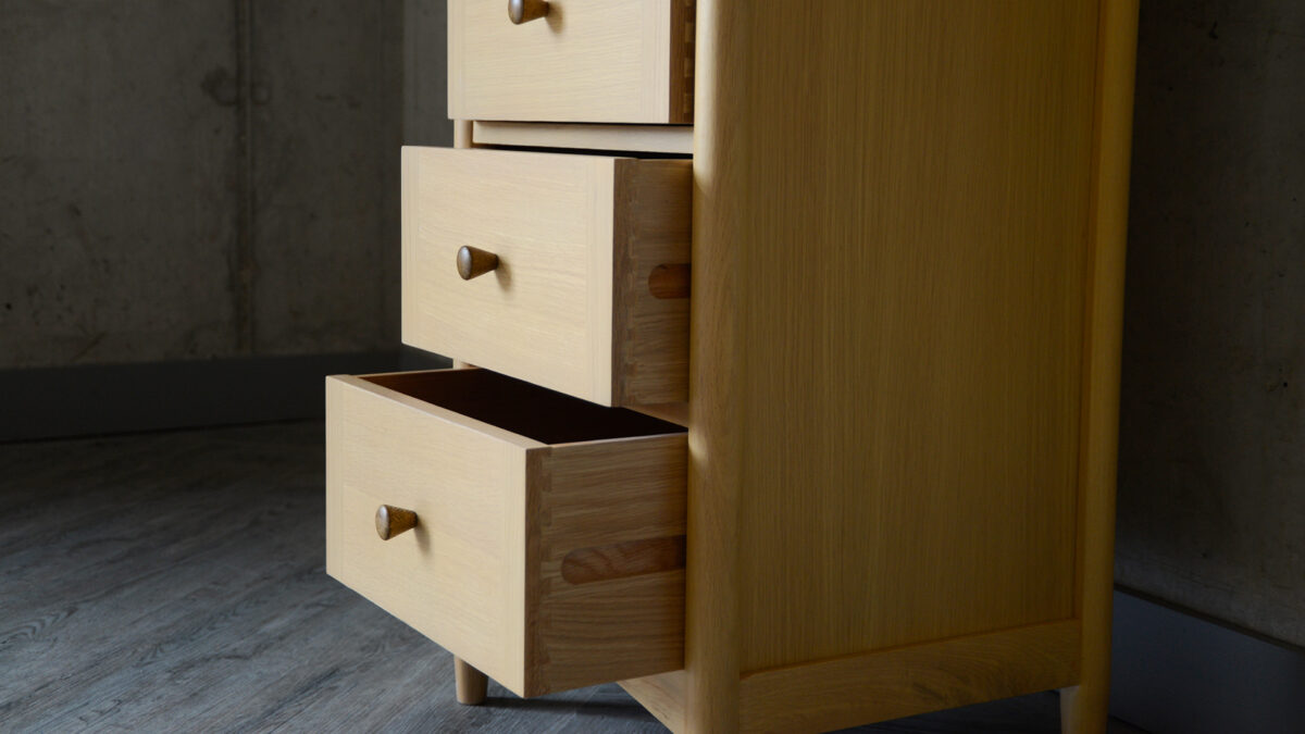 Two Tone Tallboy chest drawers detail