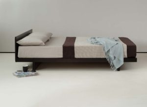 Low Japanese style bed or futon base - the Kobe, here shown in Solid Pine with Wenge stain finish