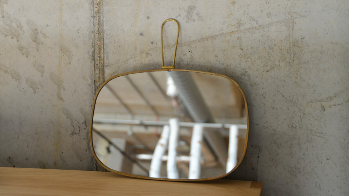 vintage look brass framed mirror to hang or hold