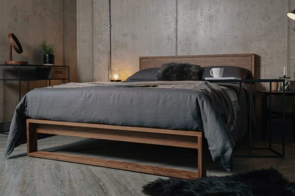 Scandinavian style bedroom - dark linen bedding on our solid walnut Leith bed