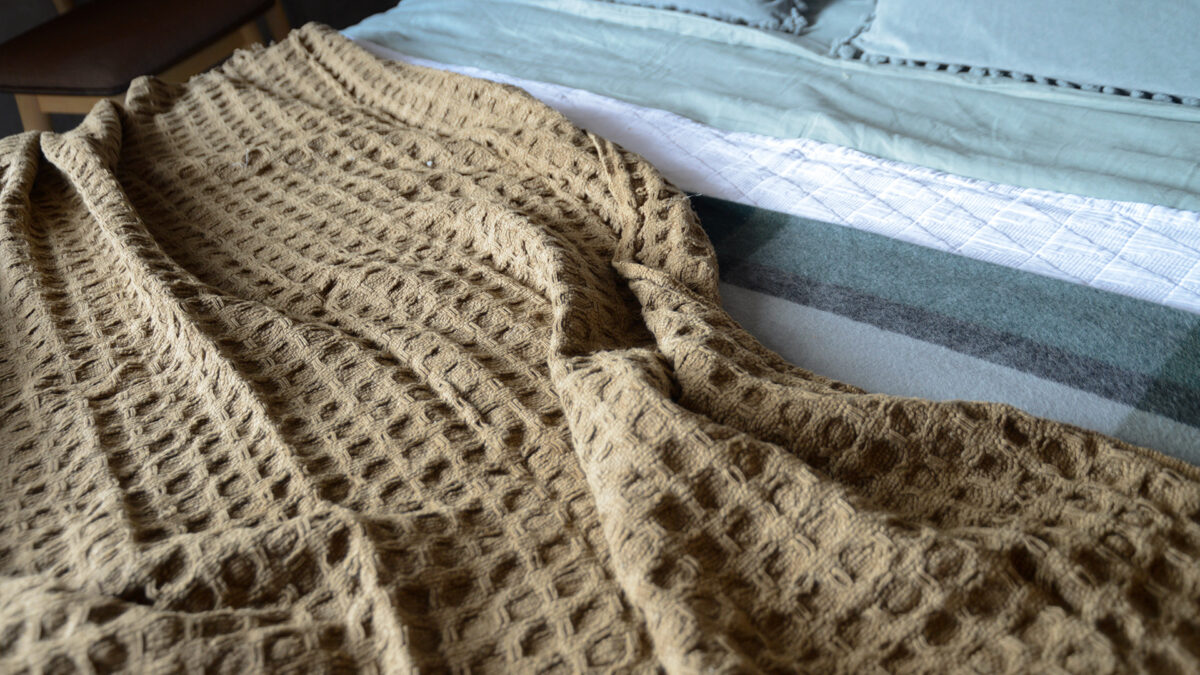 caramel colour woven grid textured throw