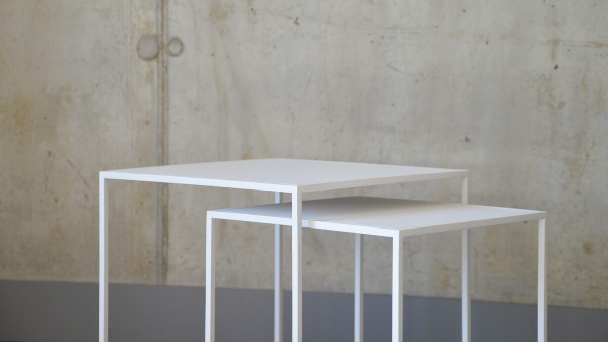 powder-coated steel nesting tables in white