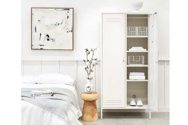 wardrobe storage locker in white shown with one door open