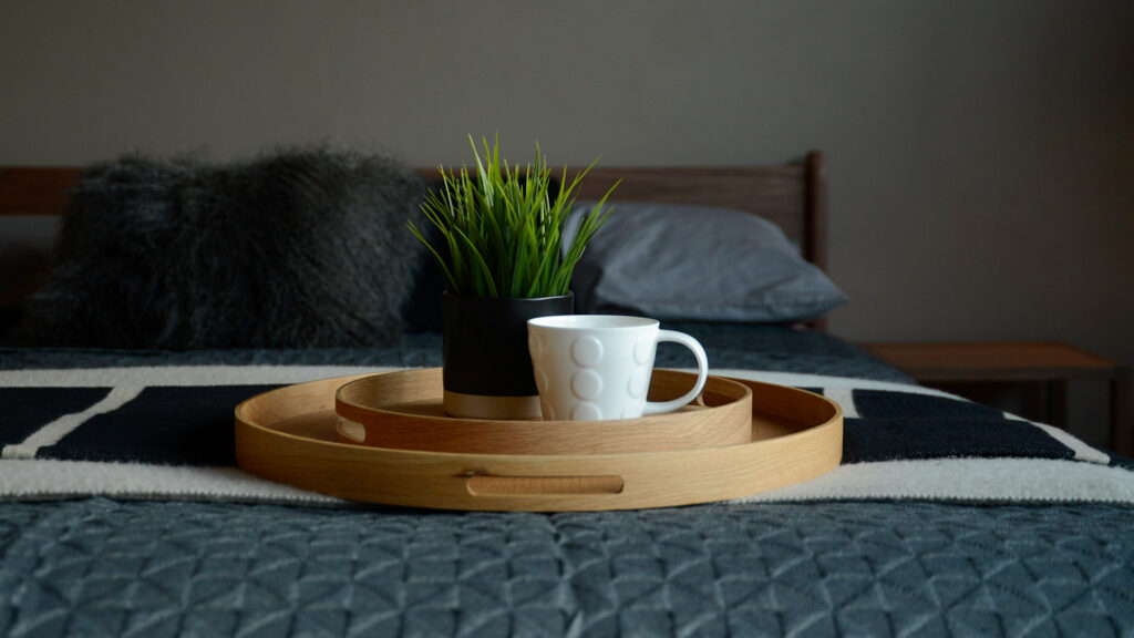Wireworks Oak Trays both sizes stacked with plant and mug