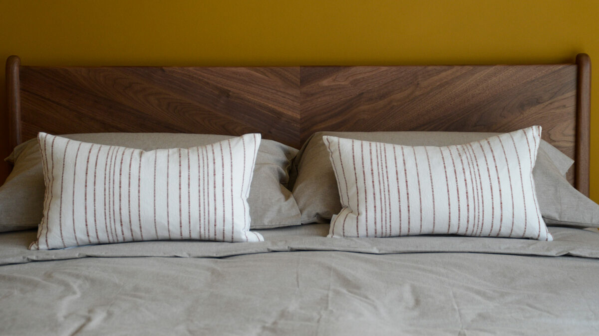 Woven Stripe Cushions Terracotta on Walnut Hoxton