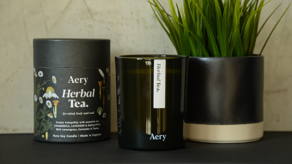 aery glass candle herbal tea side