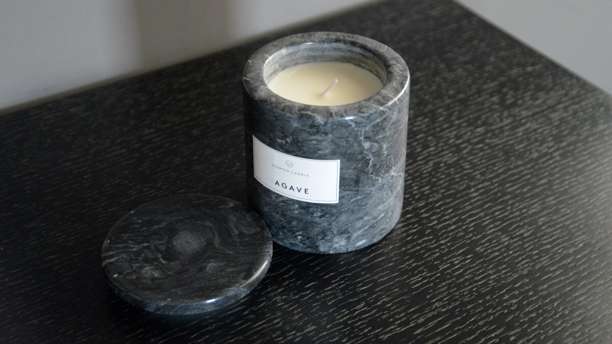 luxury scented candle in reusable marble holder with lid