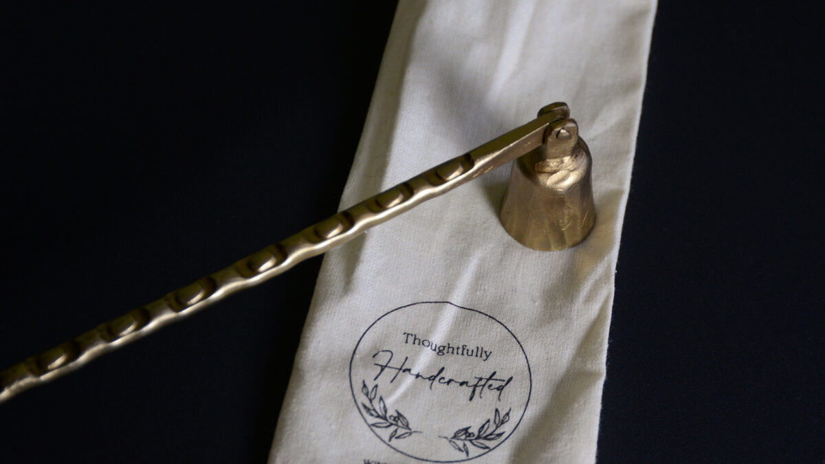 rustic brass candle snuffer with long handle and storage bag