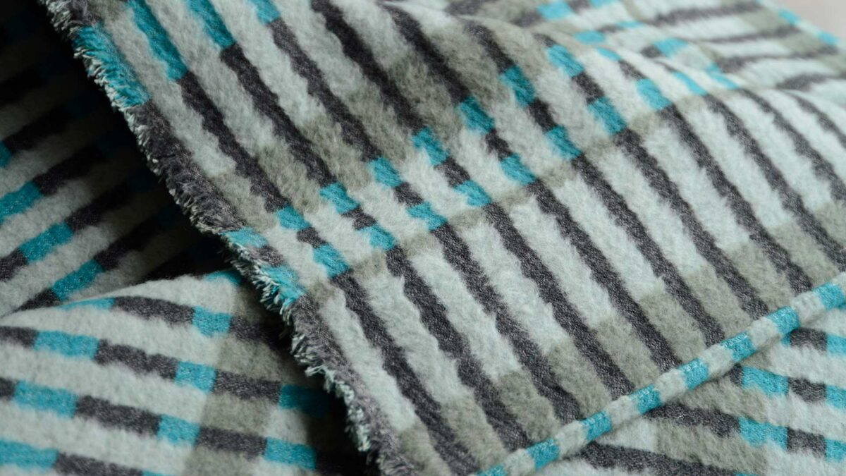 aqua and charcoal stripe throw detail