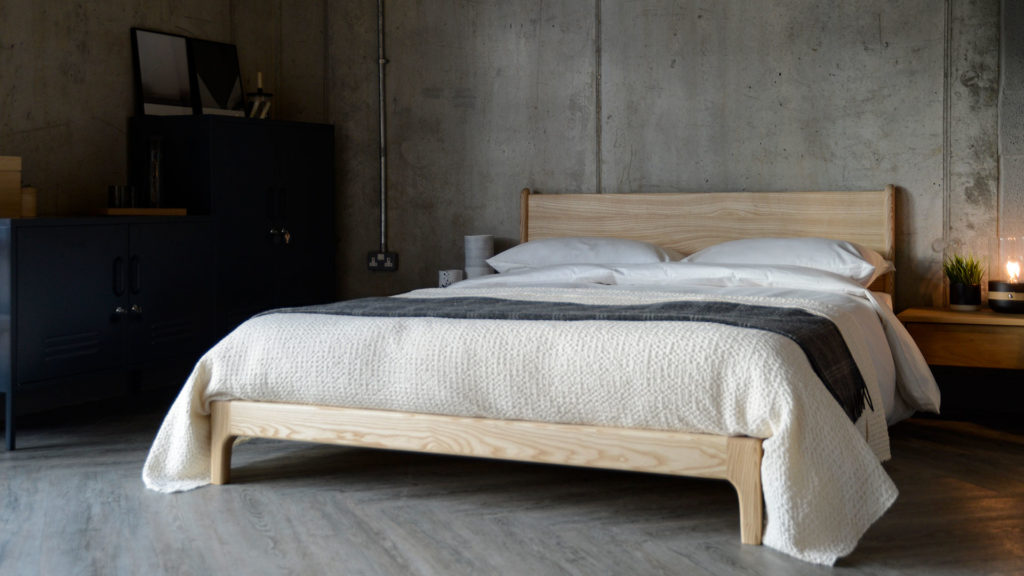 Industrial bedroom look featuring the pale ash Carnaby bed, a low hand crafted wooden bed