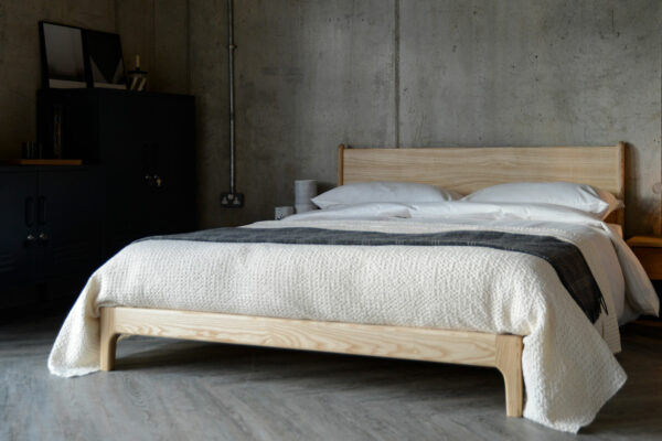 Industrial bedroom look featuring the pale ash Carnaby bed, a low hand crafted wooden bed