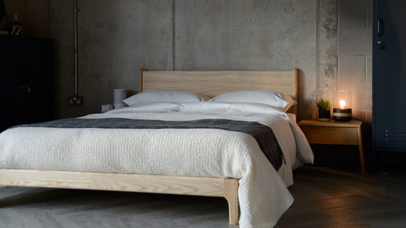 Scandi style bedroom with low wooden Carnaby bed in solid ash