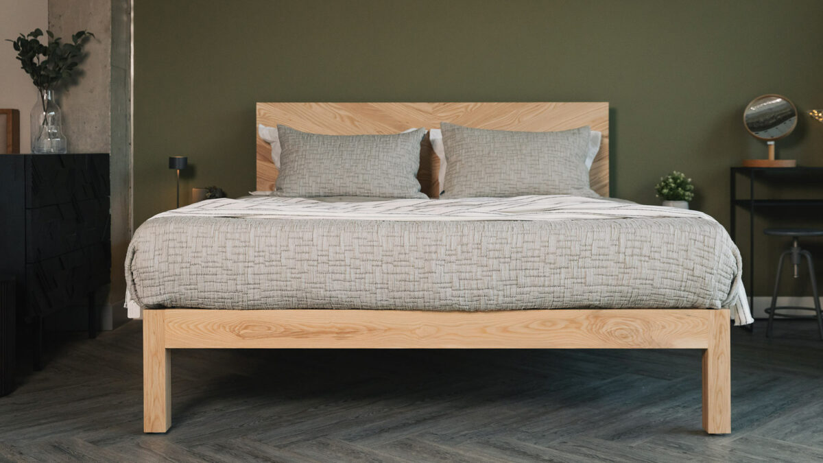 Solid Ash wood Hathersage bed with chevron pattern headboard here in Superking size