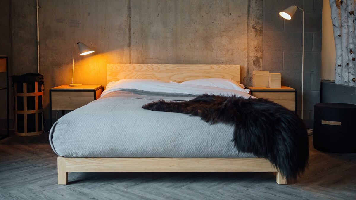 Textured grey bedspread on our ultra low solid wood Sonora bed great for loft spaces and low ceilings