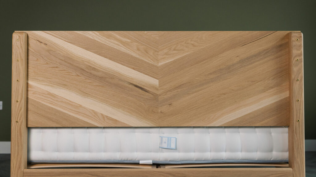 a view of the back of the headboard of our oak chevron patterned Highbury bed in kingsize