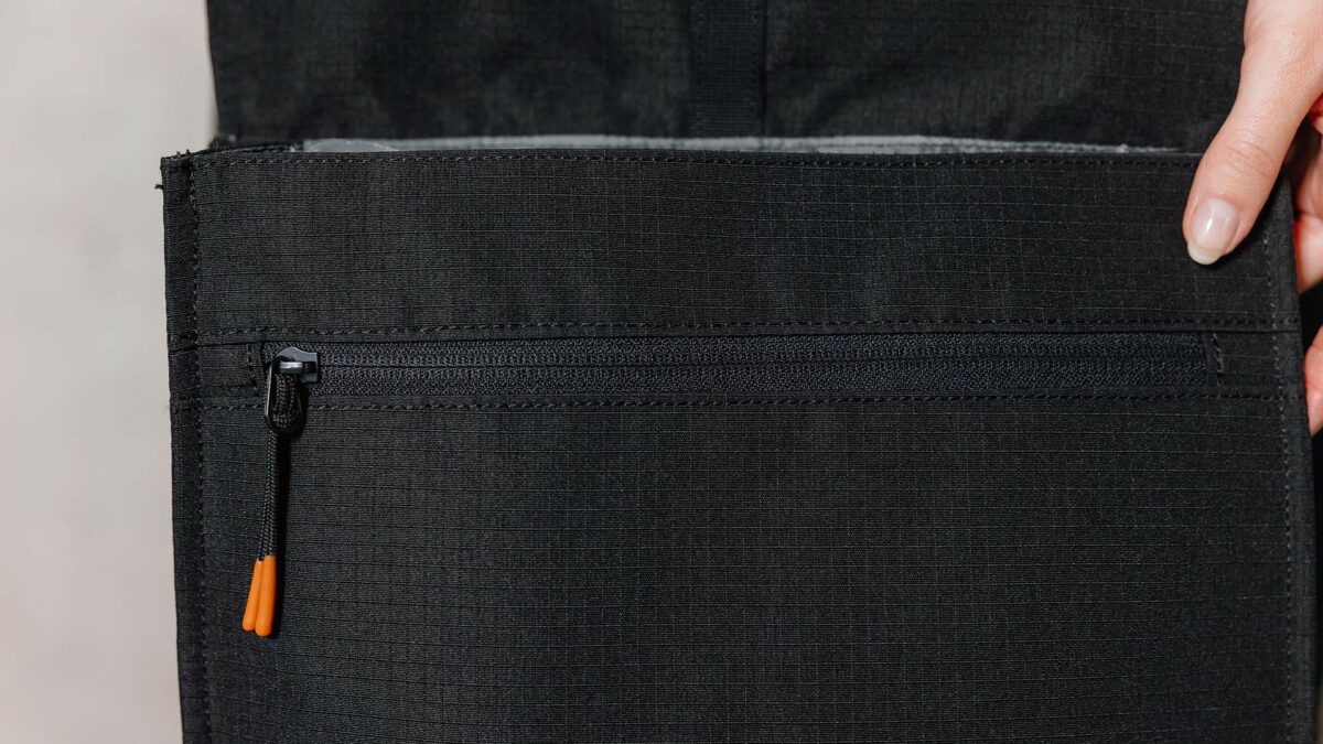 backpack open with pocket zip detail