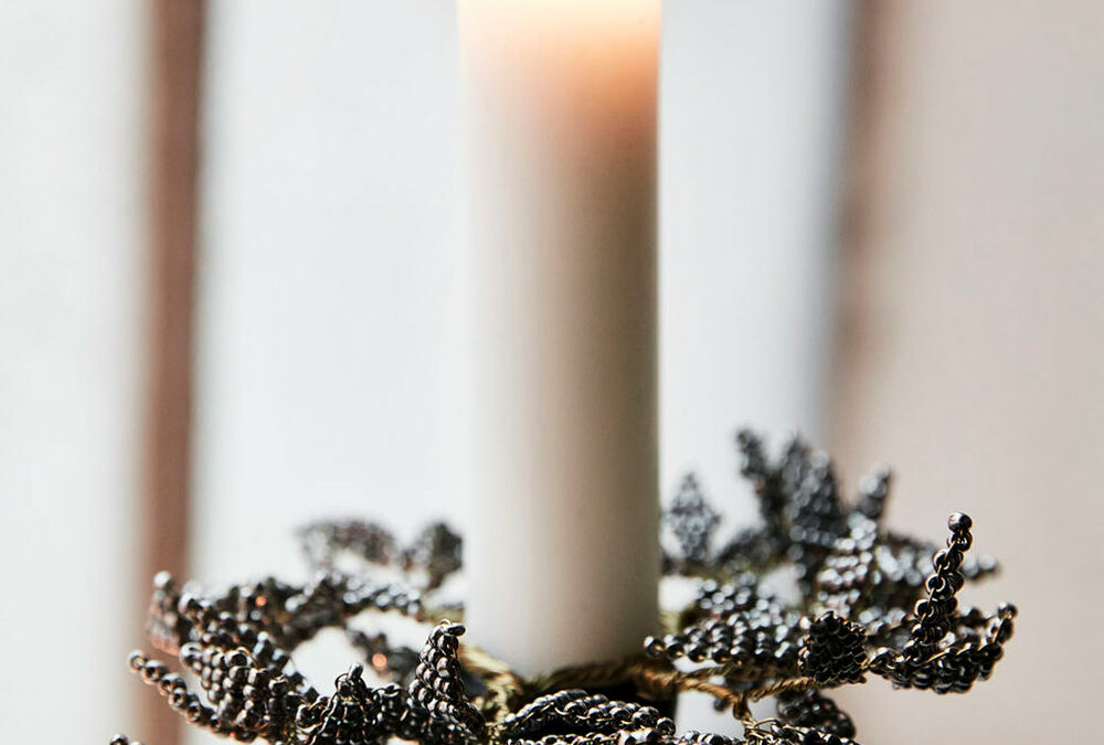 Beaded leaves dinner candle decoration shown around a candle