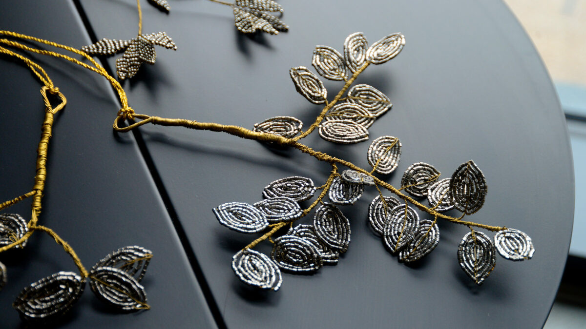 beaded christmas decorations in gold and platinum colours
