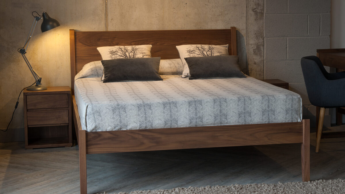 Solid wooden Classic Zanskar Bed shown in Walnut and available to order in a range of wood options.