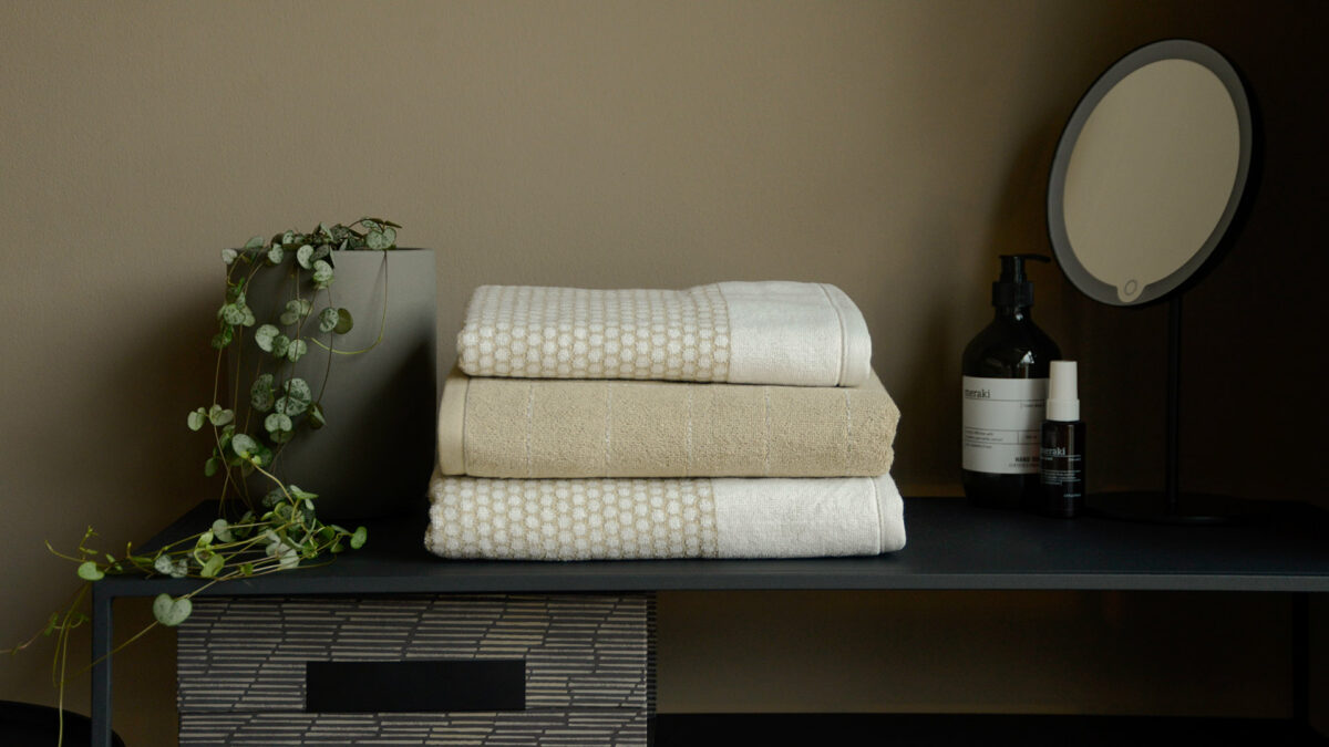 patterned towels in sandstone and white