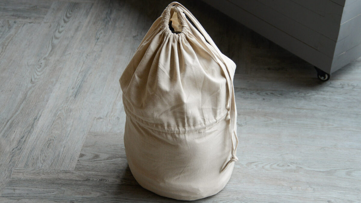 pale beige draw string laundry bag