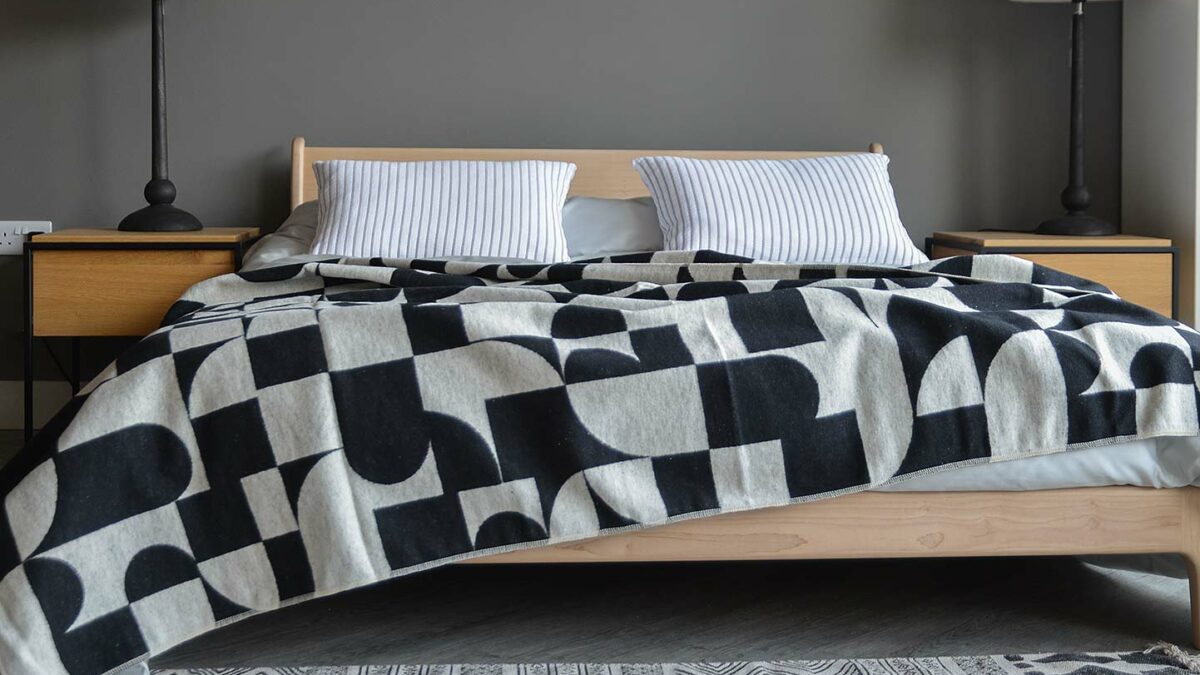 black and ivory blanket with modernist pattern 1400