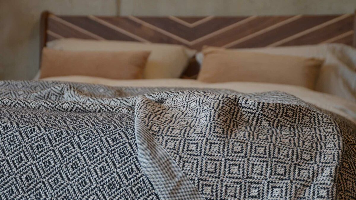 black and ivory diamond pattern bedspread
