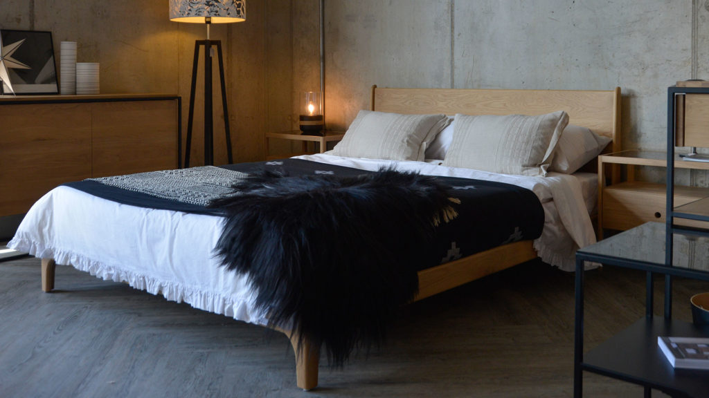 Monochrome bedding gives our hand made wooden Carnaby Bed a Scandi look.