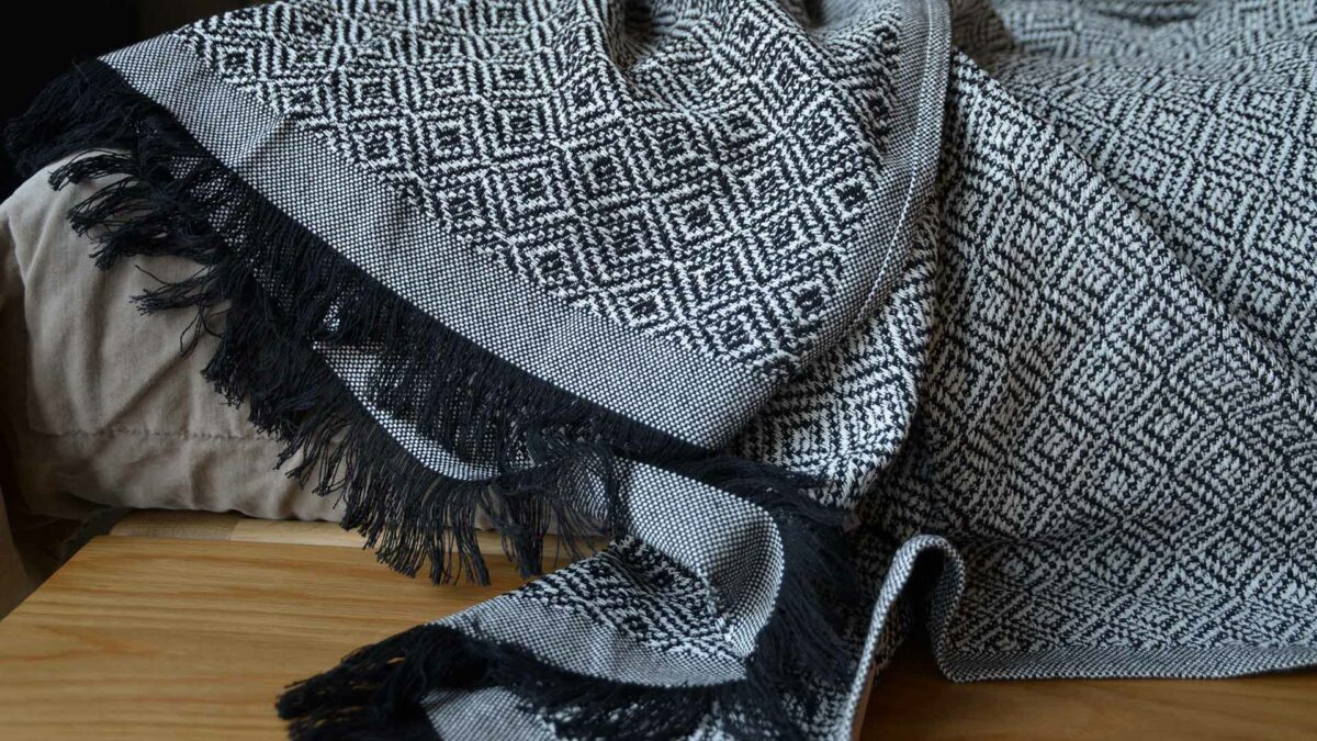 cotton rich woven design black and white throw