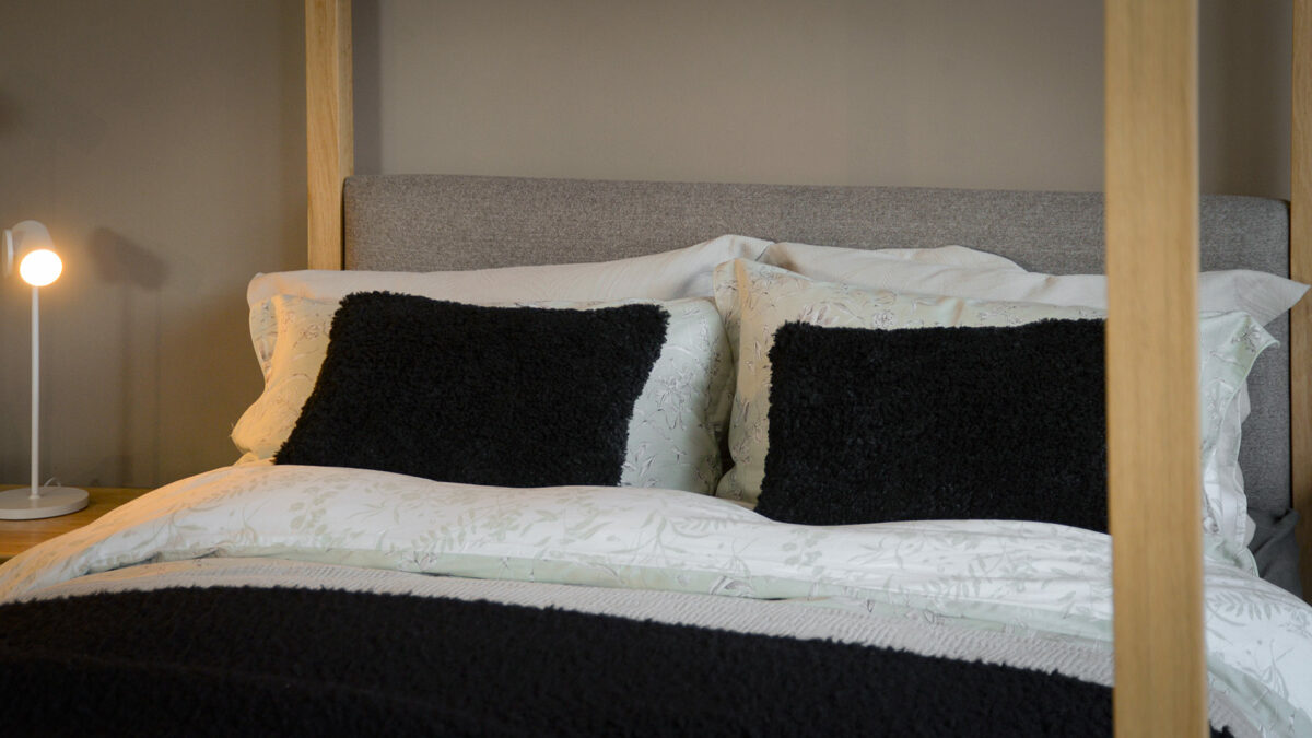 black faux sheepkskin cushions