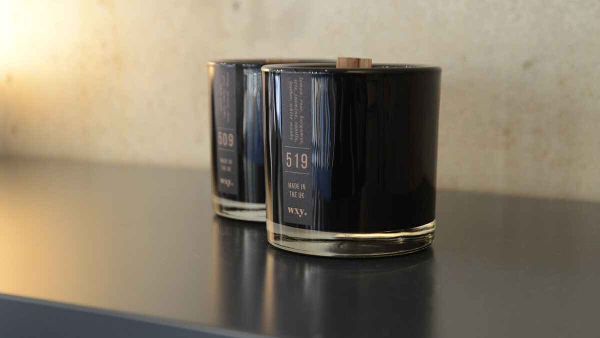 Black wax woodwick scented candles in sophisticated black glass jars