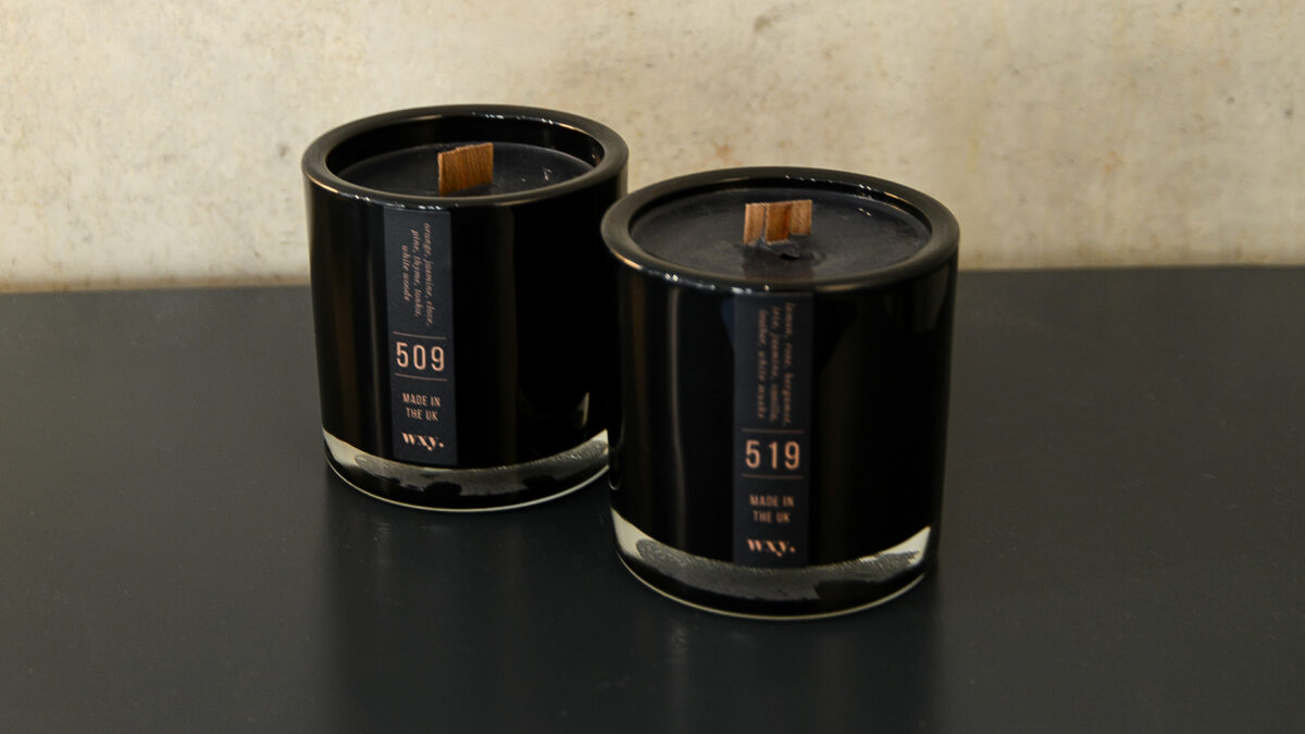 Black wax woodwick scented candles in sophisticated black glass jars